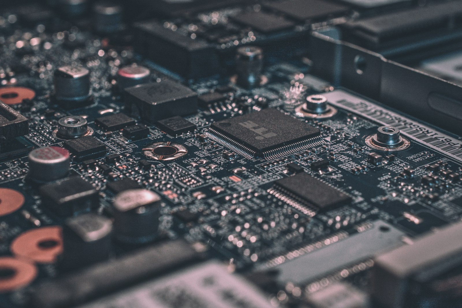 Close view of a circuit board and technology hardware